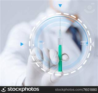 healthcare and medical concept - close up of doctor&rsquo;s hand with syringe over virtual projection. close up of doctor&rsquo;s hand with syringe