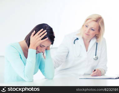 healthcare and medical concept - doctor with patient in hospital. doctor with patient in hospital