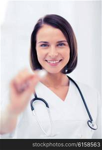 healthcare and medical concept - doctor with tablet in hospital. doctor with tablet in hospital