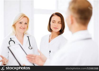 healthcare and medical concept - doctors on a meeting