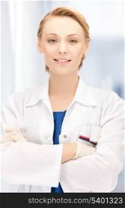 healthcare and medical concept - smiling female doctor in hospital