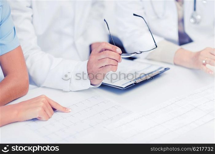 healthcare and medical concept - team or group of doctors on meeting. team or group of doctors on meeting