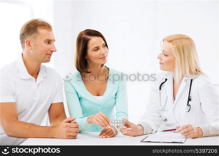 healthcare and medical - doctor giving pills to patients