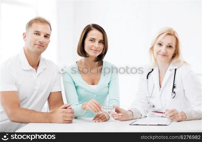 healthcare and medical - doctor giving pills to patients