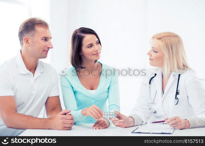 healthcare and medical - doctor giving pills to patients. doctor giving pills to patients