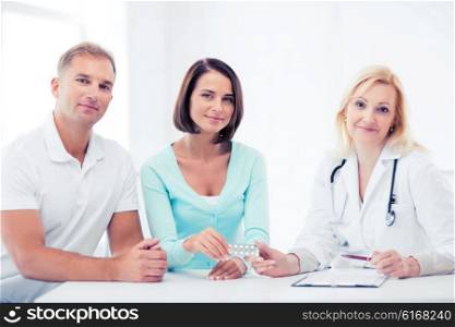 healthcare and medical - doctor giving pills to patients. doctor giving pills to patients