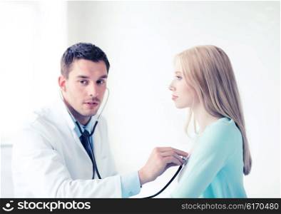 healthcare and medical - doctor with stethoscope listening to the patient in hospital. doctor with stethoscope listening to the patient