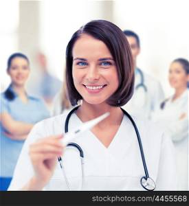 healthcare and medical - female doctor with thermometer and stethoscope. doctor with thermometer and stethoscope
