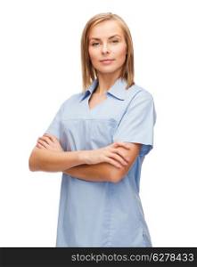 healthcare and medicine concept - calm female doctor or nurse