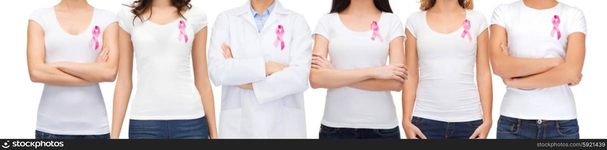 healthcare and medicine concept - group of smiling women and doctor in blank t-shirts with pink breast cancer awareness ribbons. smiling women with pink cancer awareness ribbons