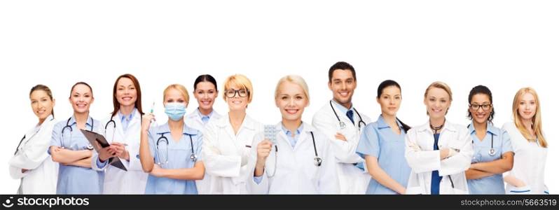 healthcare and medicine concept - smiling doctors and nurses with stethoscope