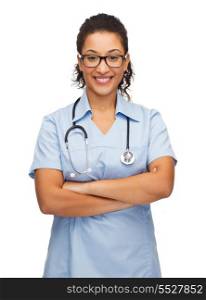 healthcare and medicine concept - smiling female african american doctor or nurse in eyeglasses with stethoscope