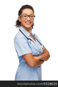 healthcare and medicine concept - smiling female african american doctor or nurse in eyeglasses with stethoscope