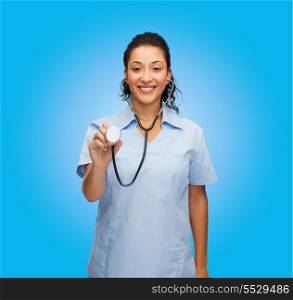 healthcare and medicine concept - smiling female african american doctor or nurse with stethoscope