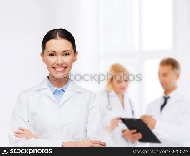 healthcare and medicine concept - smiling female doctor