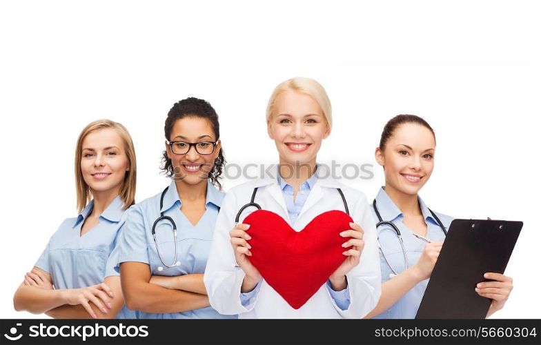 healthcare and medicine concept - smiling female doctor and nurses with red heart