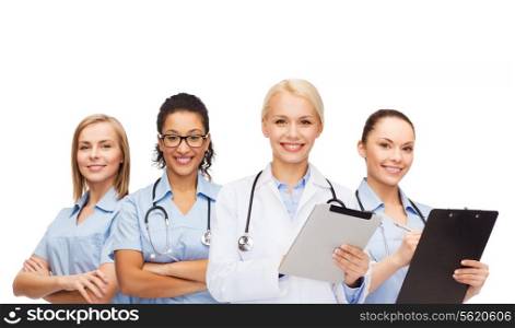 healthcare and medicine concept - smiling female doctor and nurses with tablet pc