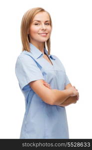 healthcare and medicine concept - smiling female doctor or nurse