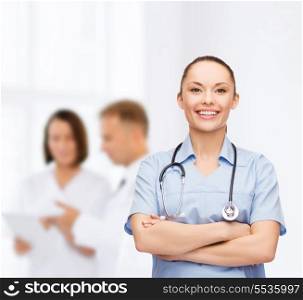 healthcare and medicine concept - smiling female doctor or nurse with stethoscope