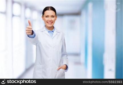 healthcare and medicine concept - smiling female doctor showing thumbs up