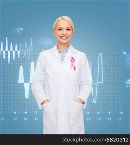 healthcare and medicine concept - smiling female doctor with pink cancer awareness ribbon over graph background