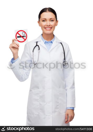 healthcare and medicine concept - smiling female doctor with stethoscope holding no smoking sign