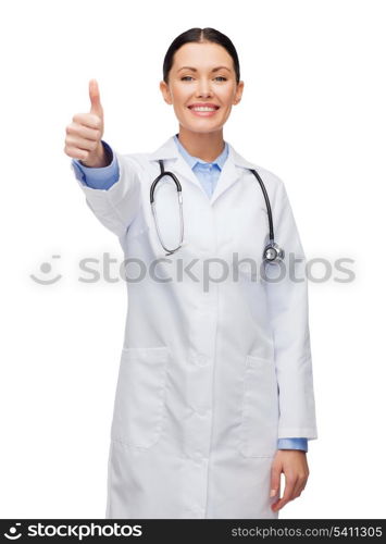 healthcare and medicine concept - smiling female doctor with stethoscope showing thumbs up