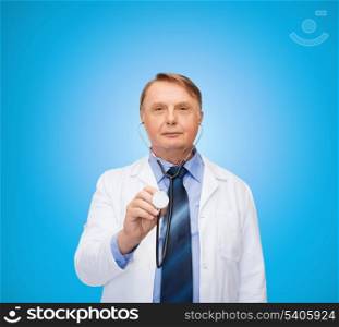 healthcare and medicine concept - smiling standing doctor or professor with stethoscope