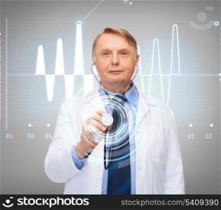 healthcare and medicine concept - smiling standing doctor or professor with stethoscope and cardiogram
