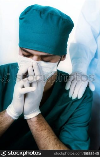 healthcare and medicine: surgeon after he failed an operation