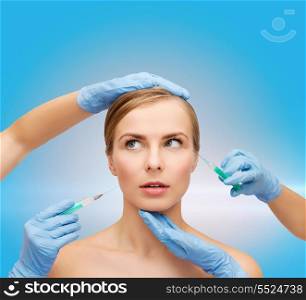 healthcare, beauty and medicine concept - beautiful scared woman face with closed eyes and beautician hands with syringe