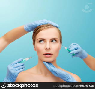healthcare, beauty and medicine concept - beautiful scared woman face with closed eyes and beautician hands with syringe