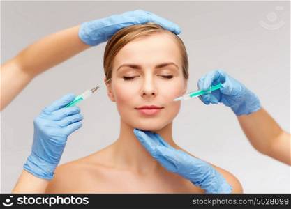 healthcare, beauty and medicine concept - beautiful woman face with closed eyes and beautician hands with syringe