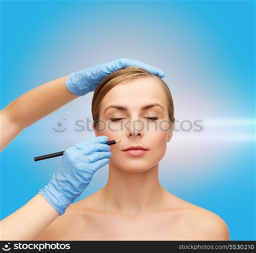 healthcare, beauty and medicine concept - beautiful woman face with closed eyes and beautician hands with pencil