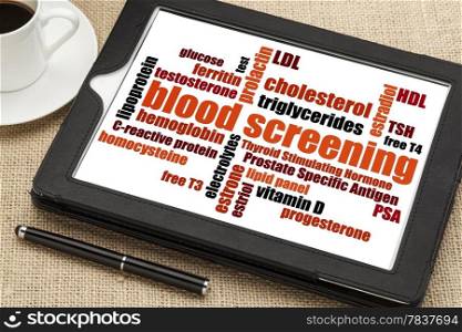 healthcare concept - blood screening word cloud on a digital tablet