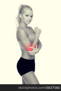 healthcare, fitness and medicine - sporty woman with pain in elbow