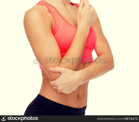 healthcare, fitness and medicine - sporty woman with pain in elbow