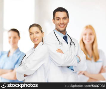 healthcare, hospital and medical concept - young team or group of doctors