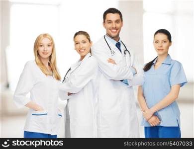 healthcare, hospital and medical concept - young team or group of doctors