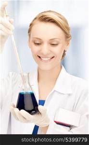 healthcare, laboratory and medical - female chemist holding bulb with chemicals