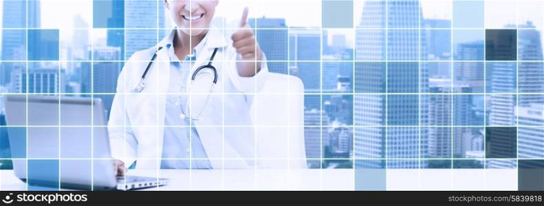 healthcare, medical and technology concept - happy african american female doctor with laptop pc computer showing thumbs up over city and blue grid background