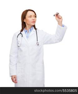 healthcare, medical and technology concept - young female doctor with stethoscope writing something in the air