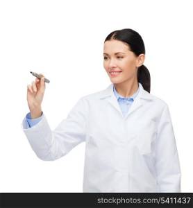 healthcare, medical and technology concept - young female doctor without stethoscope writing something in the air