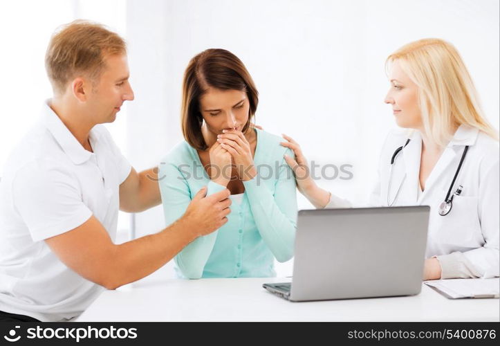 healthcare, medical and technology - doctor with patients in hospital