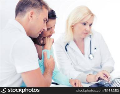 healthcare, medical and technology - doctor with patients in hospital