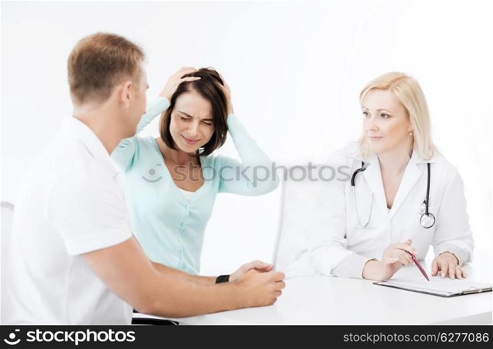 healthcare, medical and technology - doctor with patients in hospital