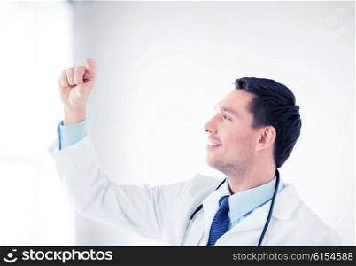 healthcare, medical and technology - young doctor holding something imaginary