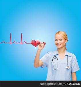 healthcare, medical and technology - young doctor or nurse drawing cardiogram