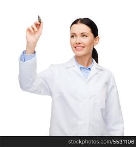 healthcare, medical and technology - young female doctor writing something in the air