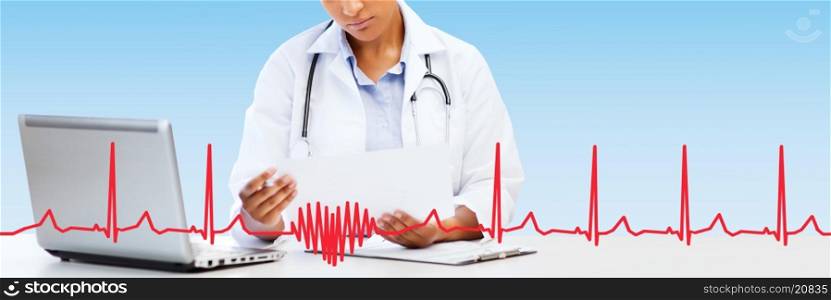 healthcare, medical diagnosis and technology concept - african female doctor with laptop pc computer looking at medical report over blue background with red heart shape and cardiogram